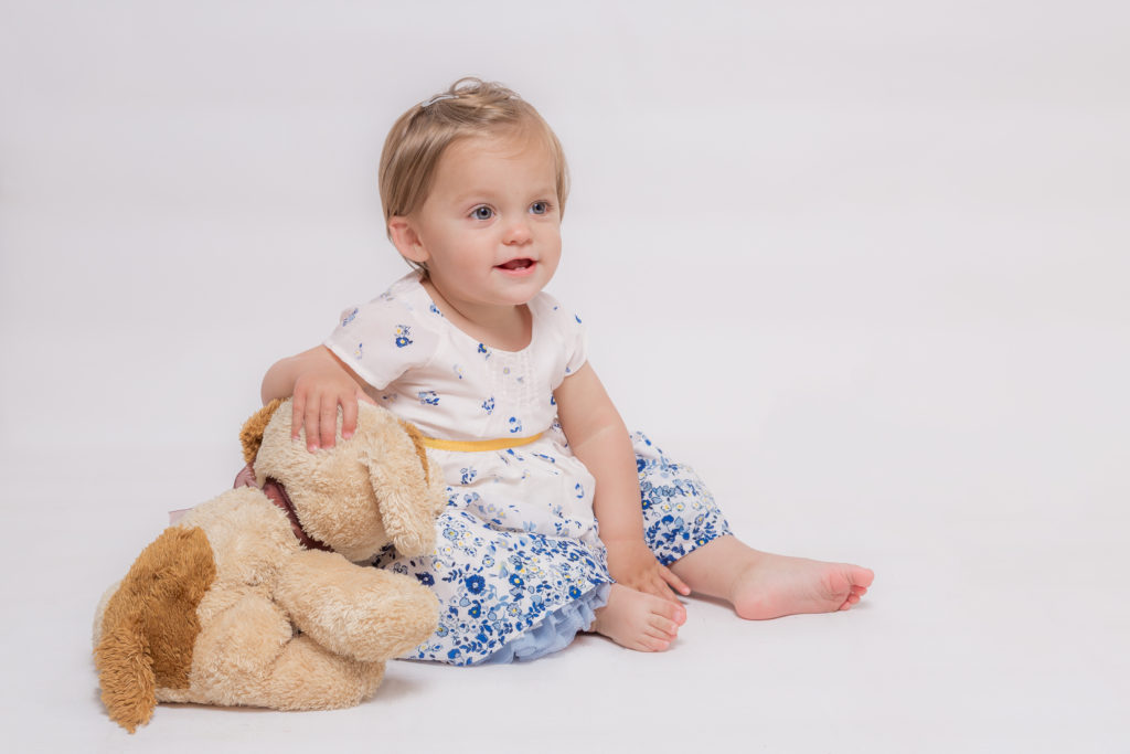 Baby with cuddly toy